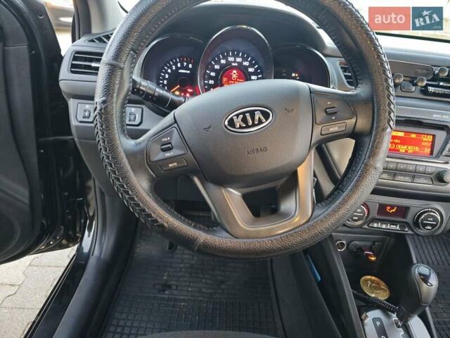Черный Киа Рио, объемом двигателя 1.59 л и пробегом 137 тыс. км за 7750 $, фото 6 на Automoto.ua