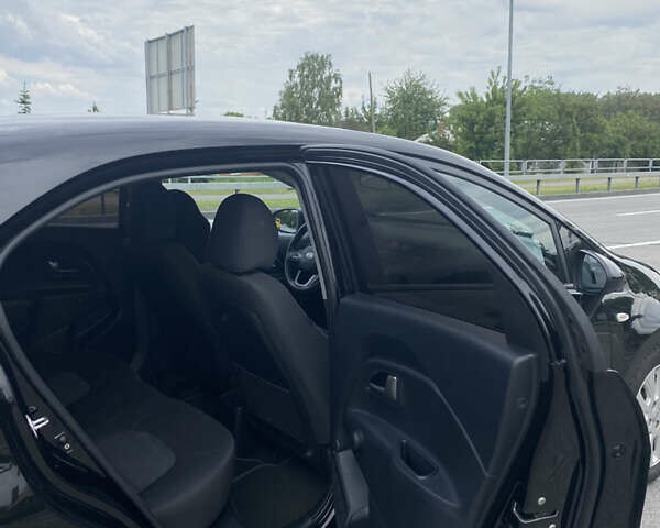 Чорний Кіа Ріо, об'ємом двигуна 1.2 л та пробігом 200 тис. км за 5700 $, фото 4 на Automoto.ua