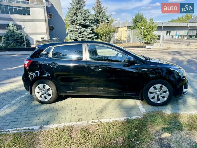 Чорний Кіа Ріо, об'ємом двигуна 1.59 л та пробігом 156 тис. км за 6700 $, фото 4 на Automoto.ua