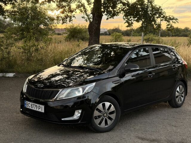 Чорний Кіа Ріо, об'ємом двигуна 1.6 л та пробігом 165 тис. км за 7800 $, фото 2 на Automoto.ua