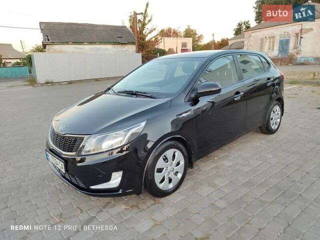 Чорний Кіа Ріо, об'ємом двигуна 1.4 л та пробігом 41 тис. км за 8500 $, фото 3 на Automoto.ua