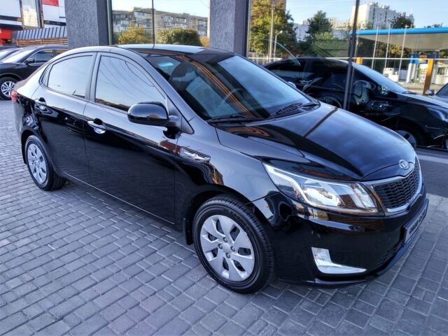 Чорний Кіа Ріо, об'ємом двигуна 1.6 л та пробігом 33 тис. км за 10700 $, фото 8 на Automoto.ua