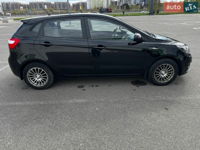 Черный Киа Рио, объемом двигателя 1.4 л и пробегом 125 тыс. км за 6000 $, фото 2 на Automoto.ua