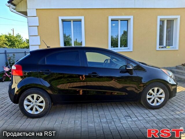 Чорний Кіа Ріо, об'ємом двигуна 1.6 л та пробігом 144 тис. км за 7300 $, фото 4 на Automoto.ua