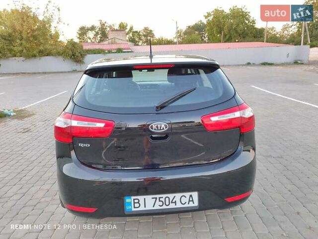 Чорний Кіа Ріо, об'ємом двигуна 1.4 л та пробігом 41 тис. км за 8500 $, фото 11 на Automoto.ua