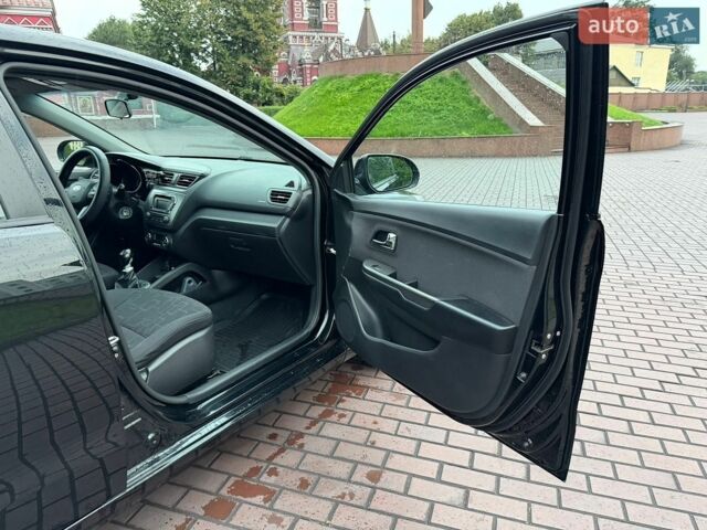 Черный Киа Рио, объемом двигателя 1.6 л и пробегом 94 тыс. км за 7300 $, фото 20 на Automoto.ua