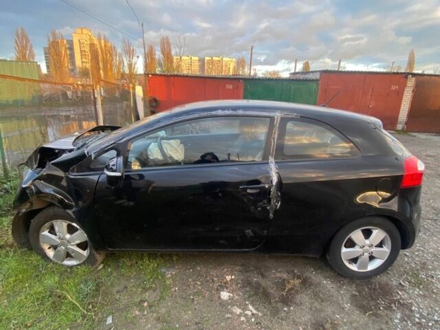 Черный Киа Рио, объемом двигателя 1.12 л и пробегом 177 тыс. км за 1700 $, фото 1 на Automoto.ua