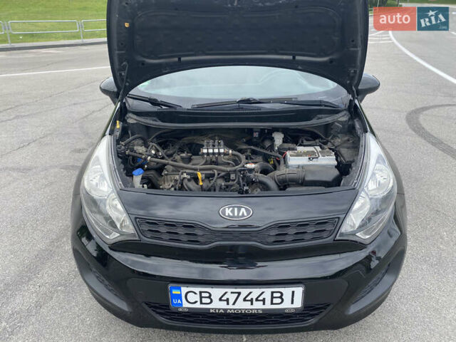 Чорний Кіа Ріо, об'ємом двигуна 1.2 л та пробігом 200 тис. км за 5700 $, фото 1 на Automoto.ua