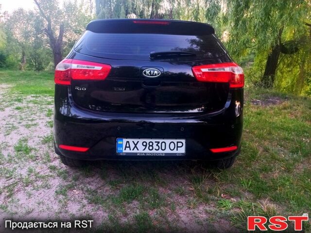 Чорний Кіа Ріо, об'ємом двигуна 1.6 л та пробігом 113 тис. км за 8500 $, фото 2 на Automoto.ua