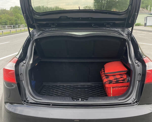 Чорний Кіа Ріо, об'ємом двигуна 1.2 л та пробігом 200 тис. км за 5700 $, фото 10 на Automoto.ua