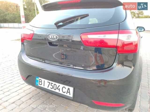 Чорний Кіа Ріо, об'ємом двигуна 1.4 л та пробігом 41 тис. км за 8500 $, фото 24 на Automoto.ua