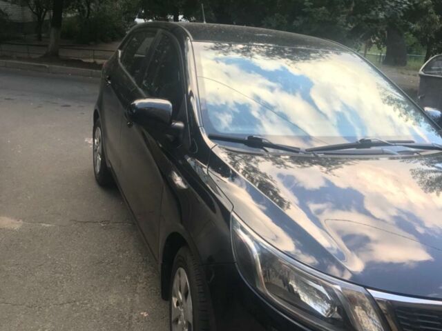 Чорний Кіа Ріо, об'ємом двигуна 1.6 л та пробігом 50 тис. км за 10200 $, фото 3 на Automoto.ua
