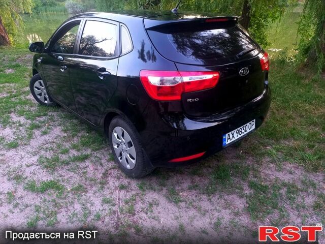 Чорний Кіа Ріо, об'ємом двигуна 1.6 л та пробігом 113 тис. км за 8500 $, фото 7 на Automoto.ua