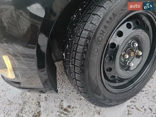 Чорний Кіа Ріо, об'ємом двигуна 1.6 л та пробігом 157 тис. км за 8300 $, фото 8 на Automoto.ua