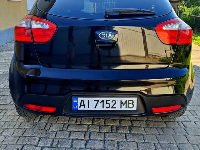 Чорний Кіа Ріо, об'ємом двигуна 1.6 л та пробігом 144 тис. км за 7300 $, фото 3 на Automoto.ua