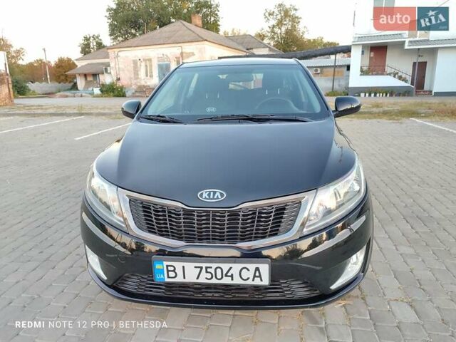 Чорний Кіа Ріо, об'ємом двигуна 1.4 л та пробігом 41 тис. км за 8500 $, фото 4 на Automoto.ua