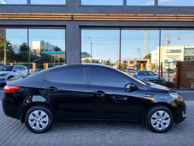 Чорний Кіа Ріо, об'ємом двигуна 1.6 л та пробігом 33 тис. км за 10700 $, фото 7 на Automoto.ua