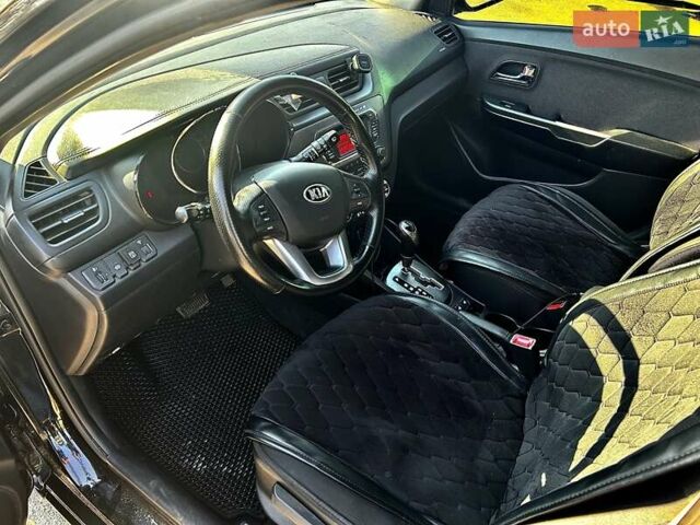 Черный Киа Рио, объемом двигателя 1.59 л и пробегом 107 тыс. км за 8300 $, фото 3 на Automoto.ua