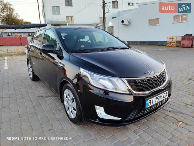 Чорний Кіа Ріо, об'ємом двигуна 1.4 л та пробігом 41 тис. км за 8500 $, фото 1 на Automoto.ua