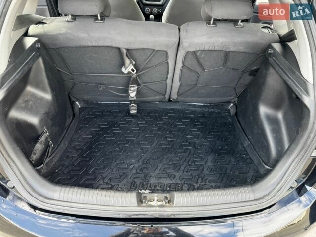 Черный Киа Рио, объемом двигателя 1.4 л и пробегом 125 тыс. км за 6000 $, фото 11 на Automoto.ua