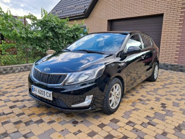Черный Киа Рио, объемом двигателя 1 л и пробегом 172 тыс. км за 5516 $, фото 2 на Automoto.ua