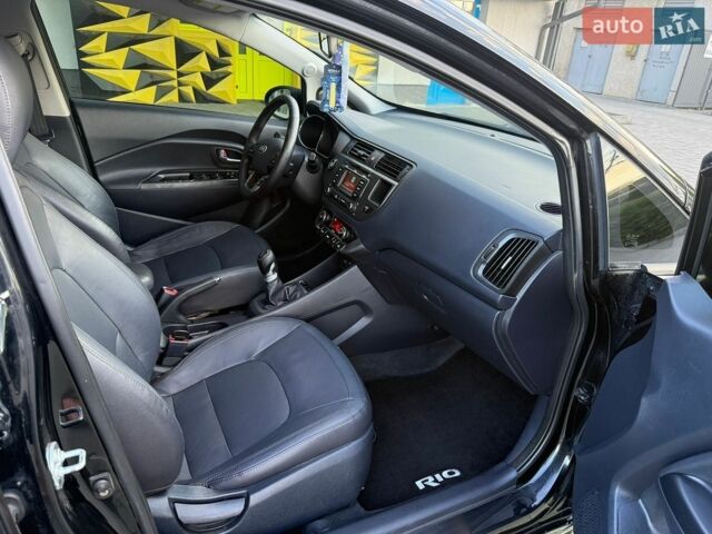 Чорний Кіа Ріо, об'ємом двигуна 1.59 л та пробігом 128 тис. км за 5500 $, фото 9 на Automoto.ua