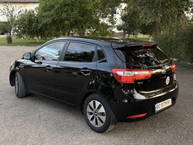 Чорний Кіа Ріо, об'ємом двигуна 1.6 л та пробігом 165 тис. км за 7800 $, фото 4 на Automoto.ua