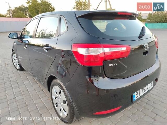 Чорний Кіа Ріо, об'ємом двигуна 1.4 л та пробігом 41 тис. км за 8500 $, фото 26 на Automoto.ua