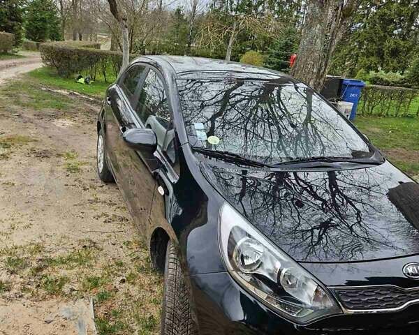 Чорний Кіа Ріо, об'ємом двигуна 1.1 л та пробігом 143 тис. км за 6830 $, фото 2 на Automoto.ua