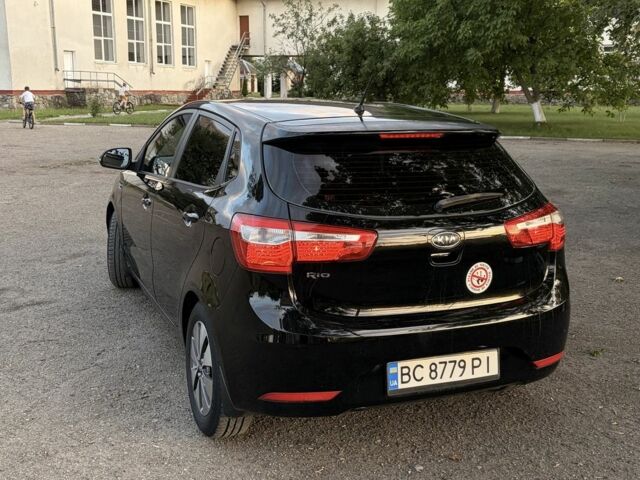 Чорний Кіа Ріо, об'ємом двигуна 1.6 л та пробігом 165 тис. км за 7800 $, фото 5 на Automoto.ua