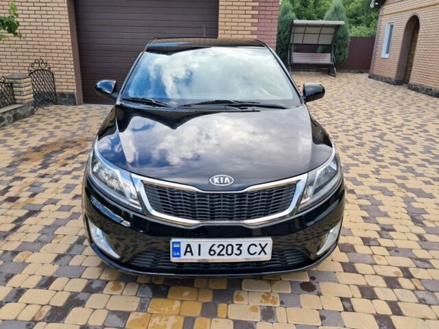 Черный Киа Рио, объемом двигателя 1 л и пробегом 172 тыс. км за 5516 $, фото 1 на Automoto.ua