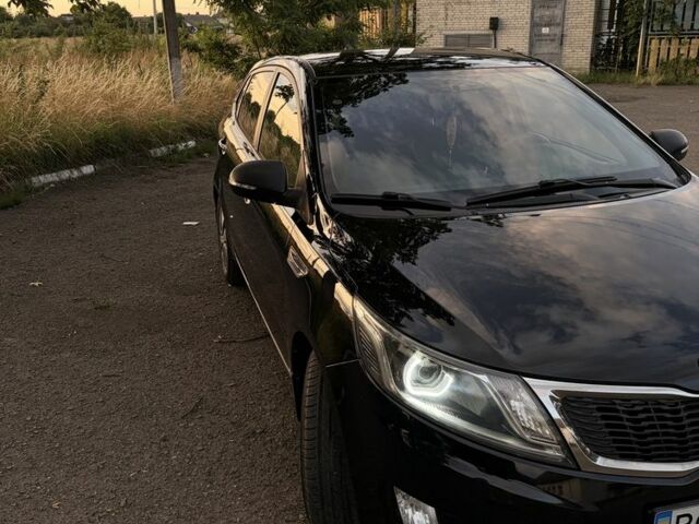 Чорний Кіа Ріо, об'ємом двигуна 1.6 л та пробігом 165 тис. км за 7800 $, фото 10 на Automoto.ua