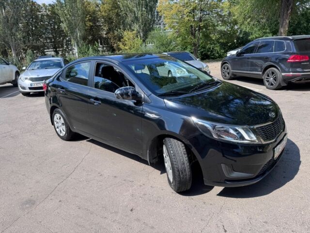 Чорний Кіа Ріо, об'ємом двигуна 1.4 л та пробігом 53 тис. км за 8507 $, фото 5 на Automoto.ua