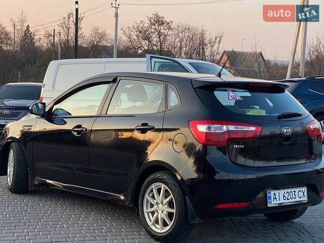 Черный Киа Рио, объемом двигателя 1.4 л и пробегом 170 тыс. км за 6700 $, фото 4 на Automoto.ua