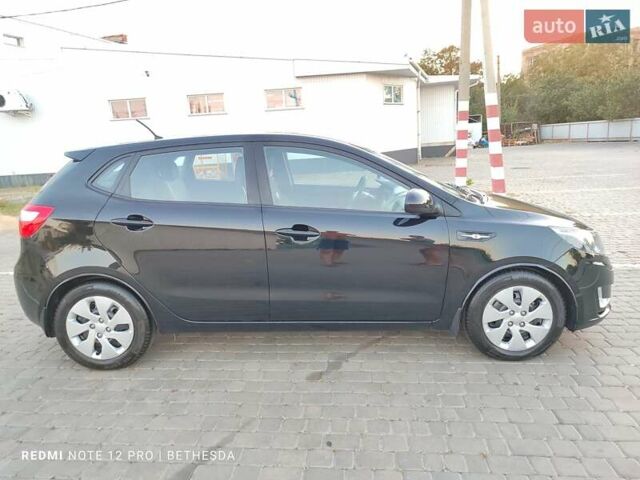 Чорний Кіа Ріо, об'ємом двигуна 1.4 л та пробігом 41 тис. км за 8500 $, фото 7 на Automoto.ua