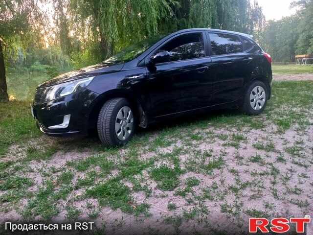 Чорний Кіа Ріо, об'ємом двигуна 1.6 л та пробігом 113 тис. км за 8500 $, фото 4 на Automoto.ua