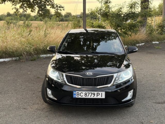 Чорний Кіа Ріо, об'ємом двигуна 1.6 л та пробігом 165 тис. км за 7800 $, фото 1 на Automoto.ua