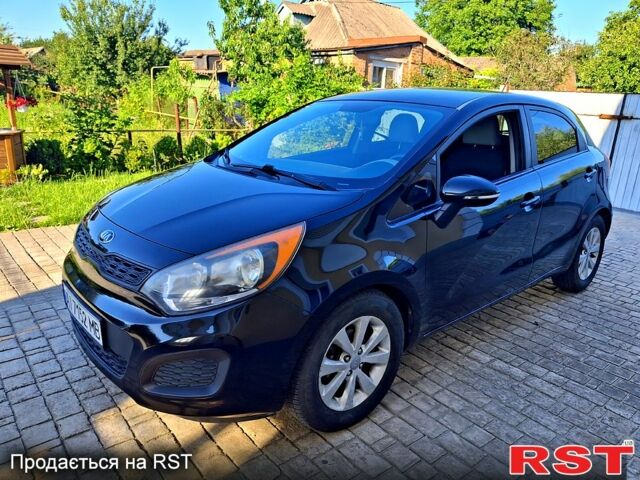 Чорний Кіа Ріо, об'ємом двигуна 1.6 л та пробігом 144 тис. км за 7300 $, фото 6 на Automoto.ua