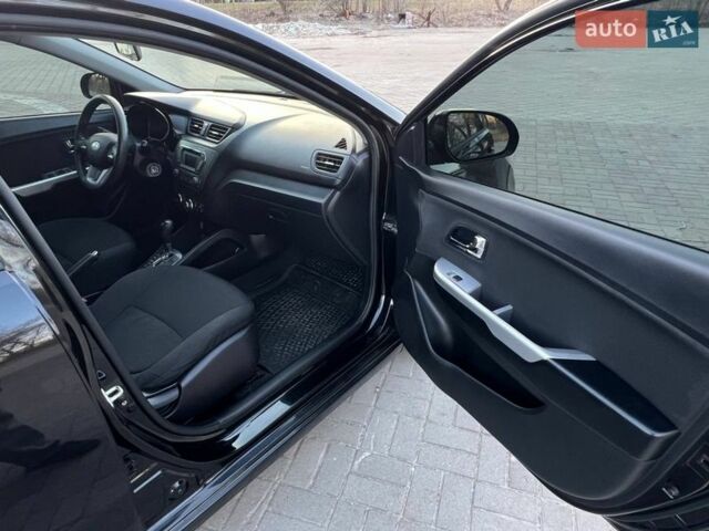 Черный Киа Рио, объемом двигателя 1.6 л и пробегом 155 тыс. км за 7300 $, фото 20 на Automoto.ua