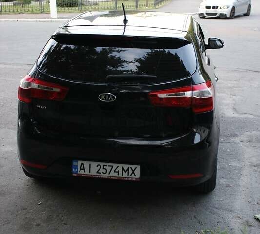 Чорний Кіа Ріо, об'ємом двигуна 1.6 л та пробігом 217 тис. км за 6200 $, фото 5 на Automoto.ua