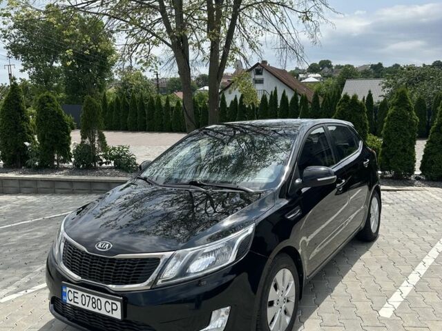 Черный Киа Рио, объемом двигателя 1.6 л и пробегом 133 тыс. км за 8200 $, фото 1 на Automoto.ua
