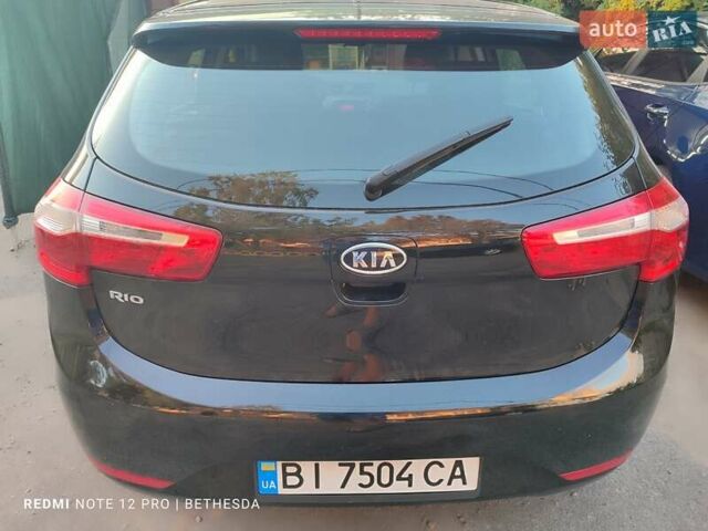 Чорний Кіа Ріо, об'ємом двигуна 1.4 л та пробігом 41 тис. км за 8500 $, фото 2 на Automoto.ua