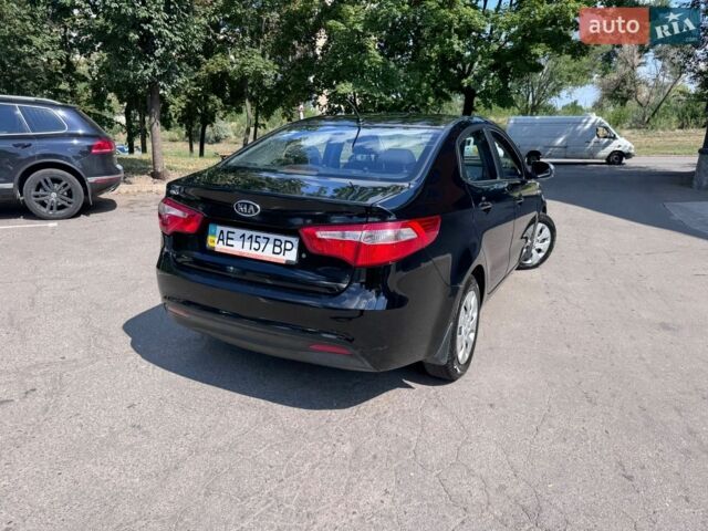 Чорний Кіа Ріо, об'ємом двигуна 1.4 л та пробігом 53 тис. км за 8501 $, фото 2 на Automoto.ua