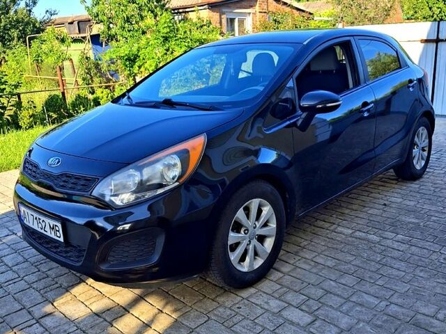 Чорний Кіа Ріо, об'ємом двигуна 1.6 л та пробігом 144 тис. км за 7300 $, фото 1 на Automoto.ua