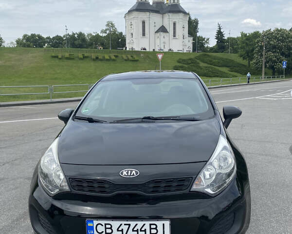 Чорний Кіа Ріо, об'ємом двигуна 1.2 л та пробігом 200 тис. км за 5700 $, фото 15 на Automoto.ua