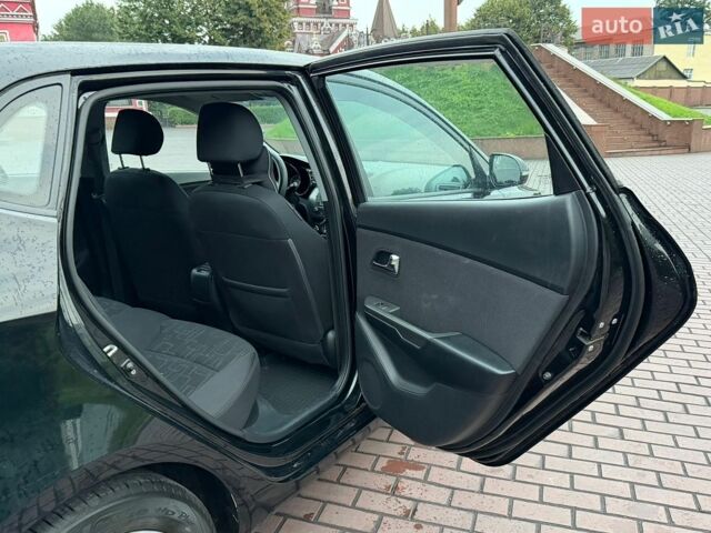 Черный Киа Рио, объемом двигателя 1.6 л и пробегом 94 тыс. км за 7300 $, фото 17 на Automoto.ua