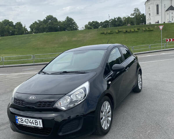 Чорний Кіа Ріо, об'ємом двигуна 1.2 л та пробігом 200 тис. км за 5700 $, фото 14 на Automoto.ua