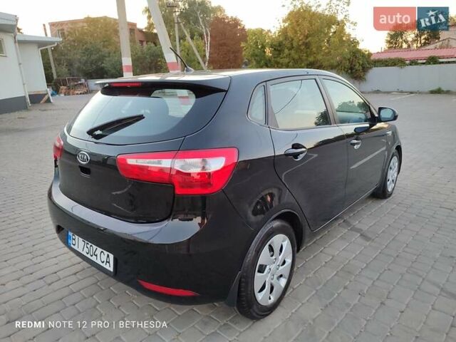 Чорний Кіа Ріо, об'ємом двигуна 1.4 л та пробігом 41 тис. км за 8500 $, фото 9 на Automoto.ua