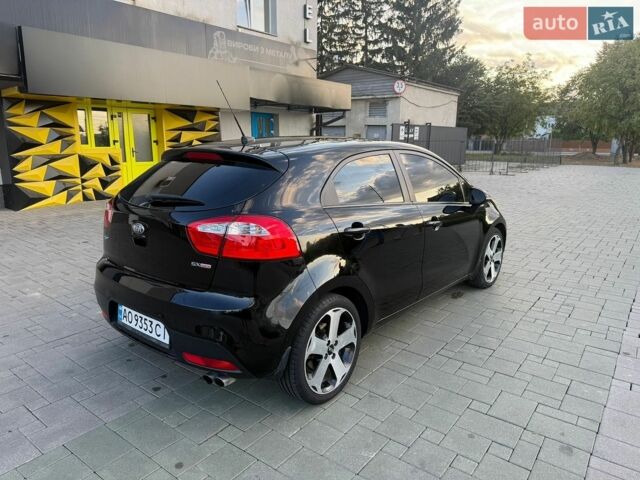 Чорний Кіа Ріо, об'ємом двигуна 1.59 л та пробігом 128 тис. км за 5500 $, фото 1 на Automoto.ua