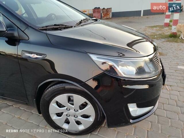 Чорний Кіа Ріо, об'ємом двигуна 1.4 л та пробігом 41 тис. км за 8500 $, фото 17 на Automoto.ua